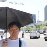 東京都心で「日傘男子」が急増中　直撃ルポでわかった「帽子じゃダメな理由」と「女性からの評判」